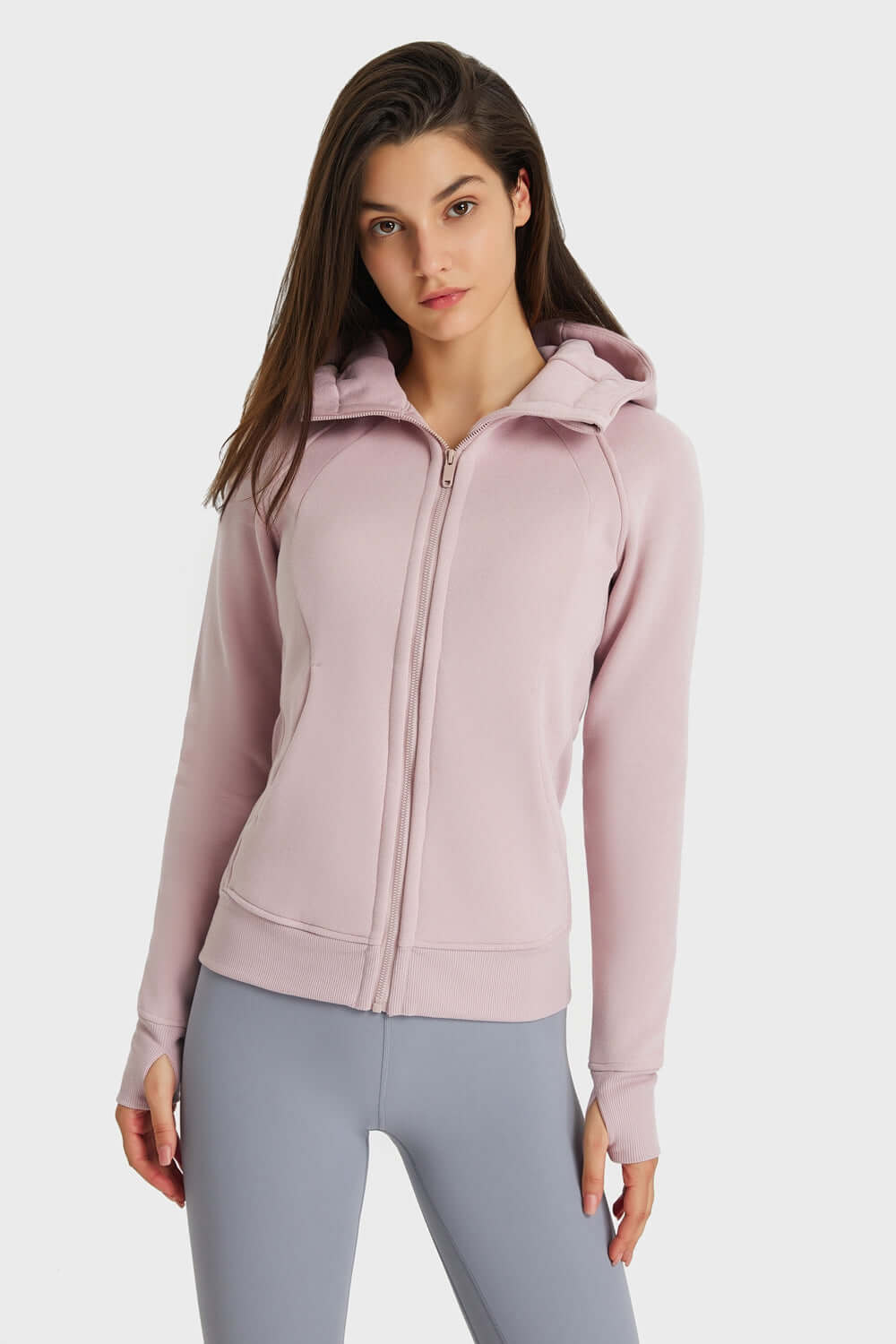 Millennia Zip Up Seam Detail Hooded Sports Jacket in soft pink, perfect for outdoor activities and stylish comfort.