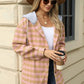 Woman wearing Bella Road Drawstring Plaid Long Sleeve Hooded Jacket in pink and beige, holding a coffee cup.