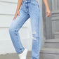 Woman wearing Bella Road Distressed Jeans with pockets, showcasing edgy style and comfort.