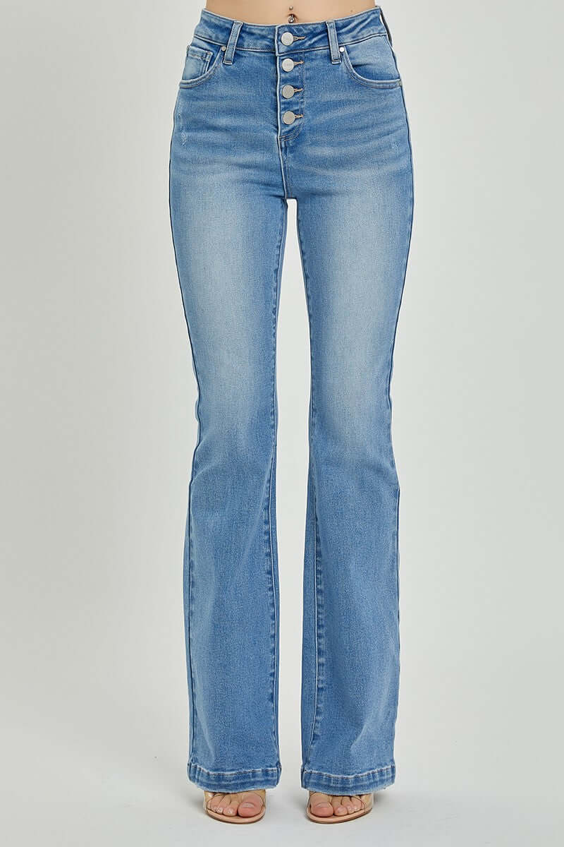 High rise button fly bootcut jeans in denim, showcasing a flattering silhouette with a vintage touch for stylish versatility.