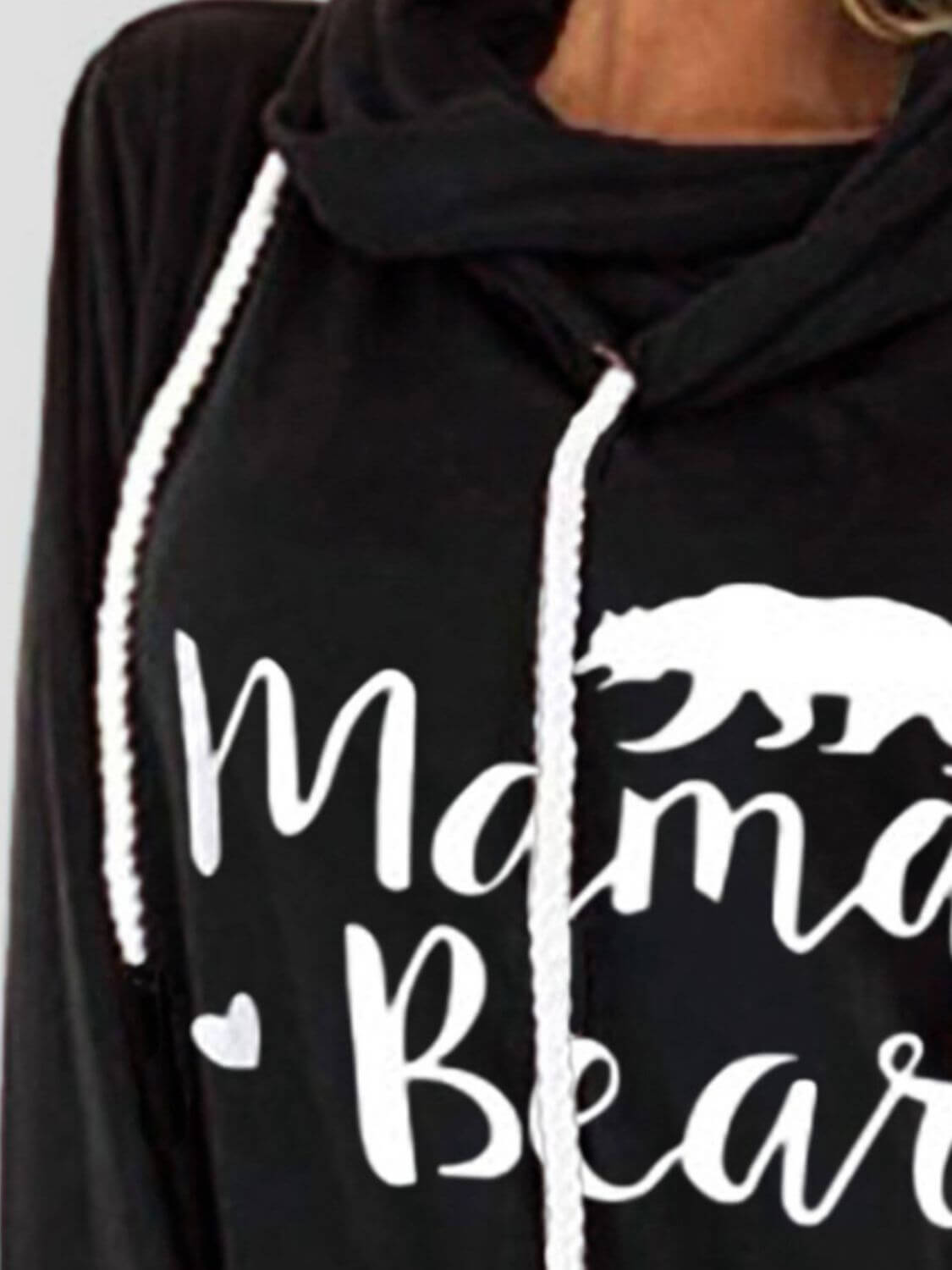 Close-up of a black Bella Road drawstring hoodie with letter graphic "Mama Bear" and bear silhouette. Long sleeve, slightly stretchy fabric.