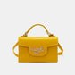 Nicole Lee USA small yellow crossbody wallet with adjustable strap made of vegan leather.