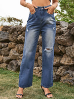 Bella Road Distressed Jeans with Pockets in Navy, featuring edgy rips and a stylish look, perfect for versatile fashion.