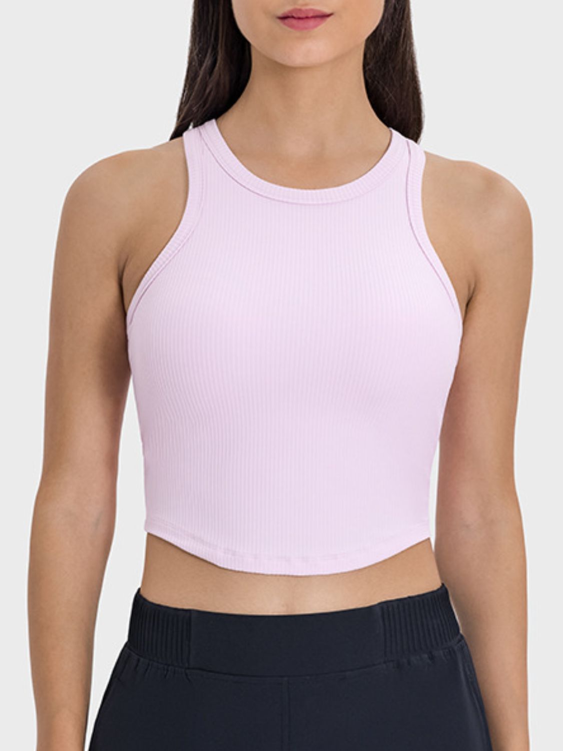 Millennia Round Neck Racerback Active Tank in soft pink, featuring a stylish crop cut and ribbed texture for a comfy workout.