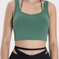 Millennia Crisscross Square Neck Active Tank in green, perfect for yoga and workouts with breathable stretch fabric.