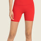 Red Millennia Seamless High-Rise Biker Shorts with wide waistband, perfect for stylish workouts or lounging at home.