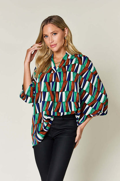 DOUBLE TAKE Full Size Geometric Notched Raglan Sleeve Blouse at Bella Road