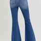 High rise distressed raw hem flare jeans showcasing a trendy and stylish retro vibe with flare legs and modern detailing.