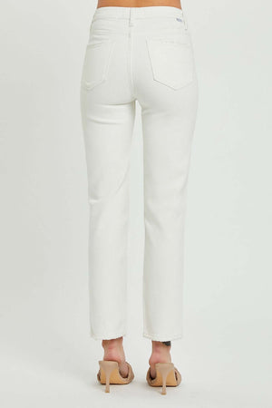 Back view of white mid-rise tummy control straight jeans by Risen Jeans, showcasing the flattering fit and stylish silhouette.