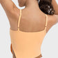 Back view of Millennia Slit Asymmetrical Neck Active Cami in orange showing stylish design and adjustable straps.