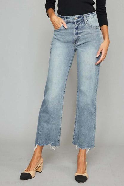 High Waist Raw Hem Cropped Wide Leg Jeans with a chic and edgy style, suitable for casual or sophisticated occasions.