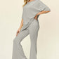 DOUBLE TAKE Full Size Round Neck Drop Shoulder T-Shirt and Flare Pants Set at Bella Road