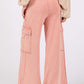 Knit Terry Mineral Wash Wide Leg Pants in soft pink with cargo pockets, shown from the back.