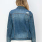 Back view of a RISEN distressed button-up denim jacket, showcasing its rugged style and classic design.