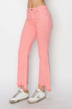 Trendy Risen Jeans raw hem bootcut jeans with functional pockets in pink, paired with casual sneakers.