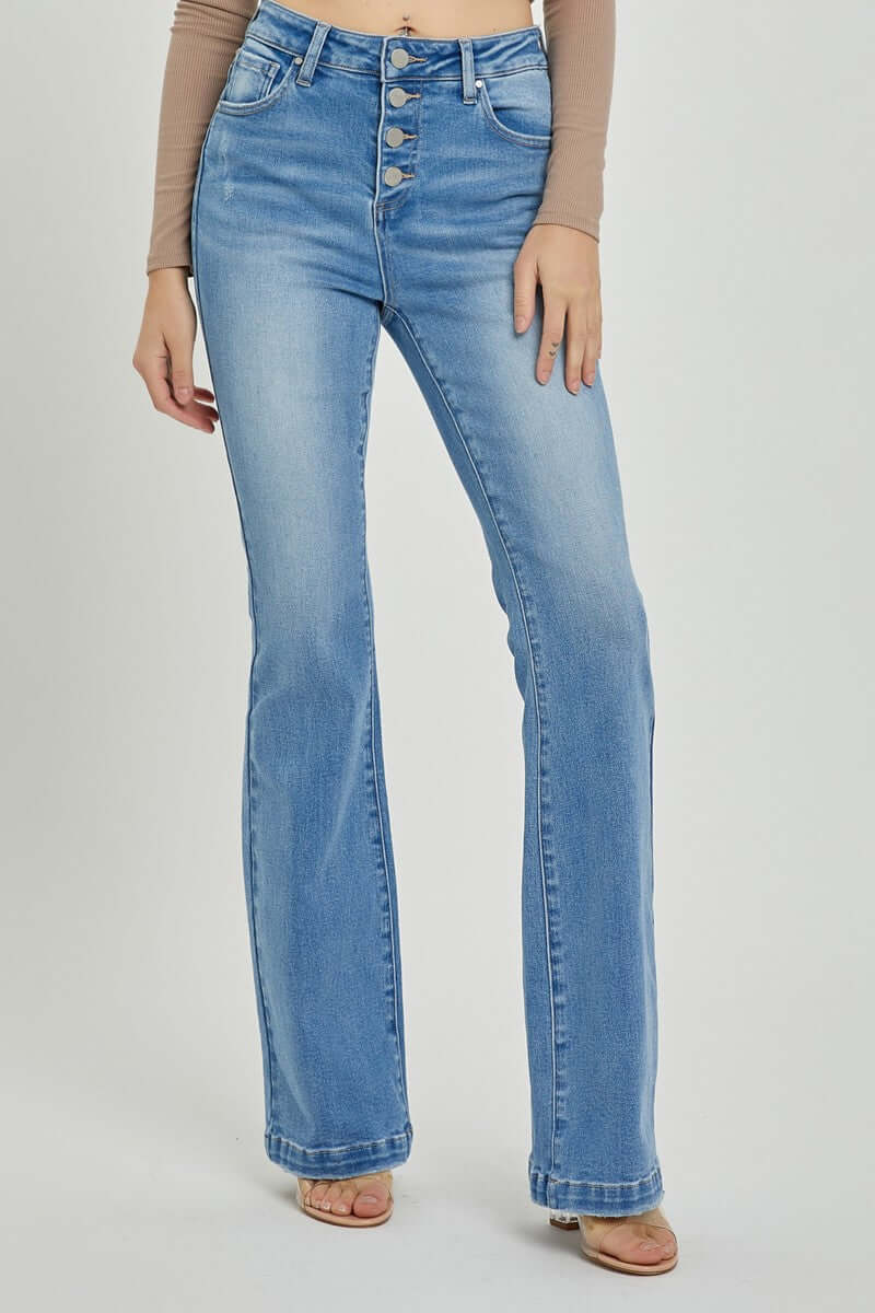 Risen high rise button fly bootcut jeans in blue denim, showcasing a flattering fit and versatile style for any occasion.