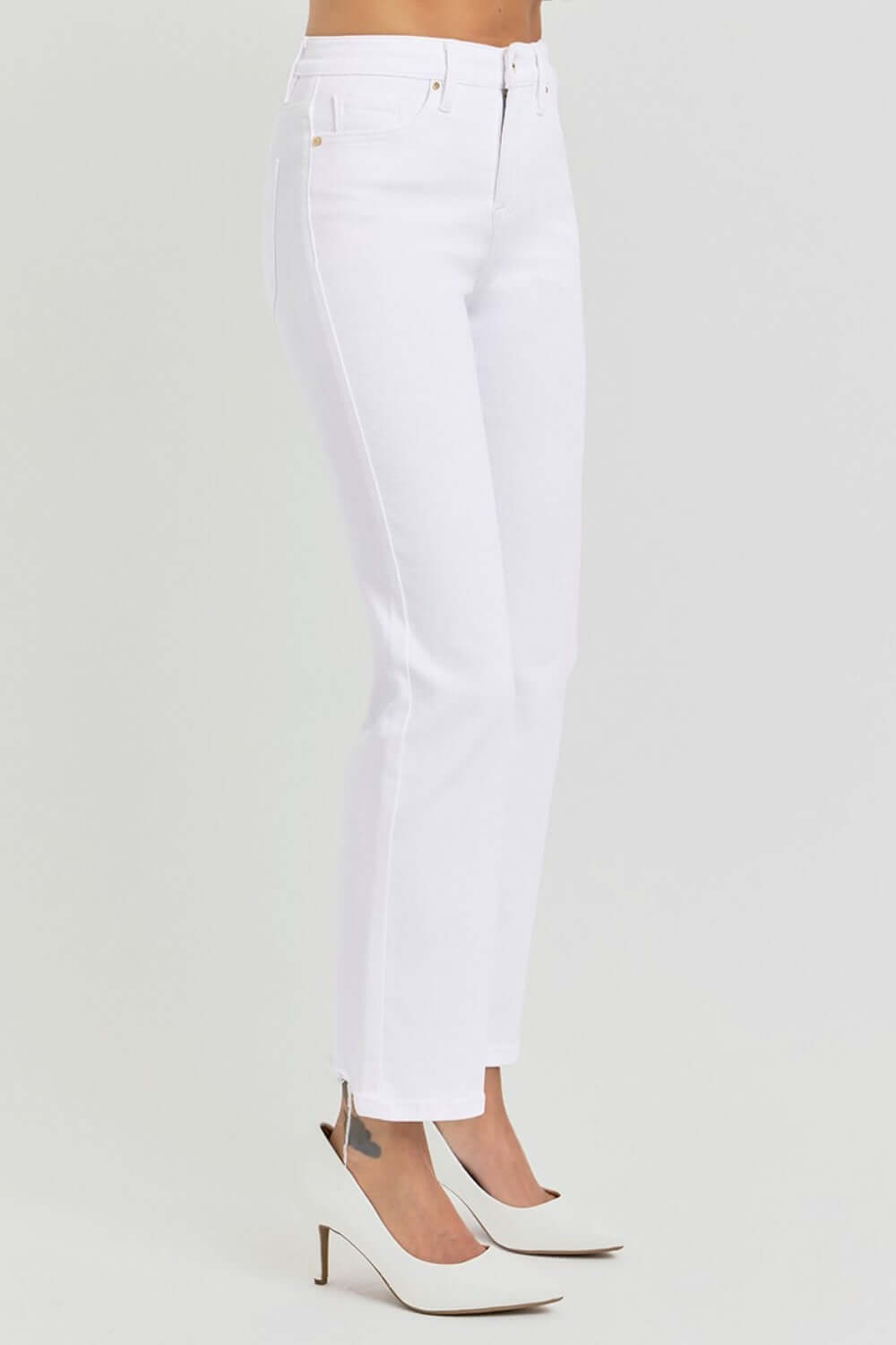 White high-rise tummy control crop jeans with elastic band offering comfort and a modern straight silhouette for everyday style.