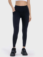 Millennia Pocketed High Waist Active Leggings showcasing a stylish design and convenient pockets for workouts.