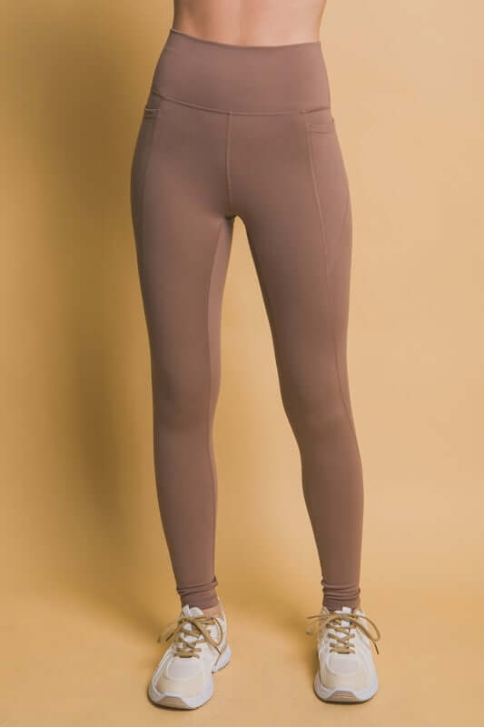 Love Tree high waist leggings in brown with side pockets, perfect for workouts and everyday wear.