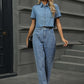 Woman wearing Pearl Detail Straight Jeans with Pockets and a denim top, standing outdoors with steps in the background