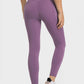 Stylish Millennia V-Waist Yoga Leggings in purple, showcasing the flattering fit and breathable design from the back.