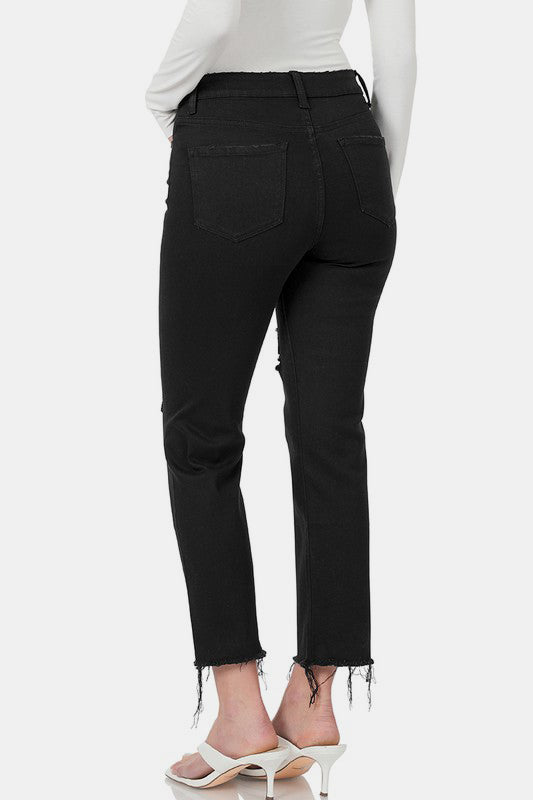 Back view of Zenana Distressed Raw Hem Cropped Jeans in black, showcasing the raw hem and stylish fit. Perfect for any outfit!