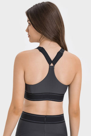 Back view of Millennia Contrast Sports Bra showcasing crisscross straps and stylish design for optimal support during workouts.