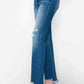 bytos mid-rise straight jeans with raw hem and distressed details, perfect for edgy and stylish outfits.