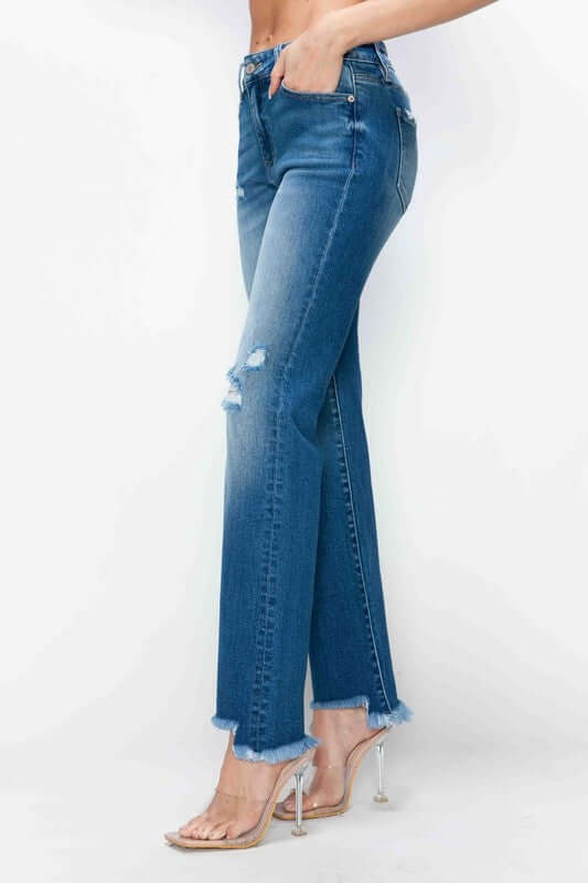 bytos mid-rise straight jeans with raw hem and distressed details, perfect for edgy and stylish outfits.