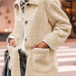 Woman wearing Bella Road Sherpa Pocketed Collared Neck Long Sleeve Jacket in urban setting