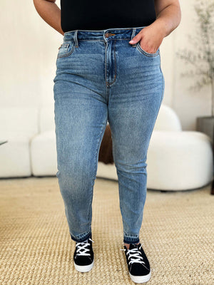 Full Size Mid Rise Rigid Magic Release Hem Judy Blue Jeans with black sneakers