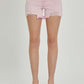 High Rise Distressed Denim Shorts in pink by Risen Jeans, featuring a flattering high-rise fit and edgy distressed detailing