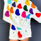 Multicolor ghost printed long sleeve top and shorts set on a dark background, quirky and fun style for casual occasions.