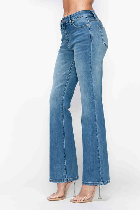 Side view of bytos Cat's Whiskers Mid Rise Bootcut Jeans in blue, showcasing a flattering fit and stylish bootcut design.