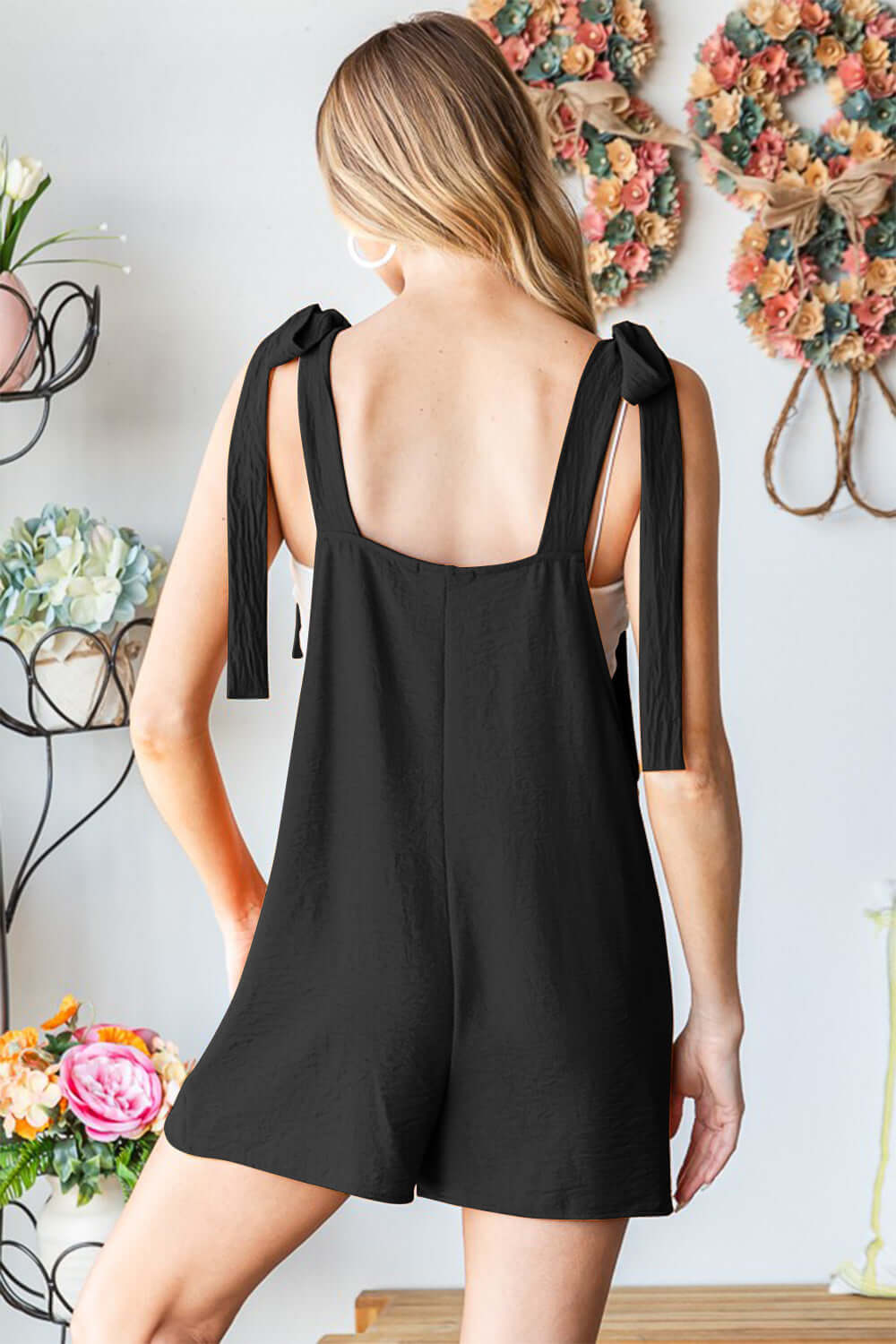 HEIMISH Full Size Sleeveless Romper with Pockets at Bella Road