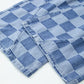 Close-up of Bella Road Checkered Wide Leg Jeans with Pockets, featuring a bold checkered pattern in shades of blue.