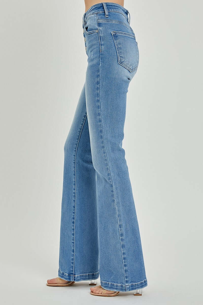 High rise button fly bootcut jeans side view, showcasing vintage style and comfortable denim fit for versatile occasions.