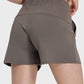 Millennia elastic waist active shorts in a stylish gray, showcasing pockets and a comfortable fit from the back.