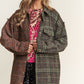 Stylish tweed plaid longline shacket with snap-down closure, perfect for layering in fall fashion.