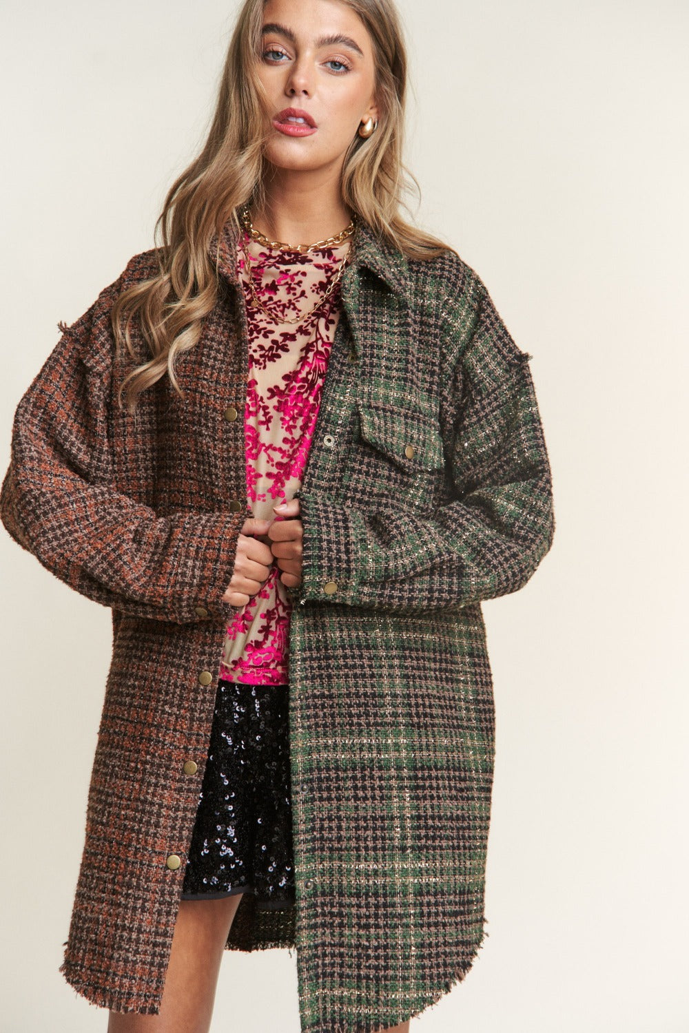 Stylish tweed plaid longline shacket with snap-down closure, perfect for layering in fall fashion.