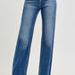 High rise raw cut jeans with tummy control, designed for a slim look and stylish comfort.