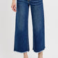 Stylish RISEN Raw Hem Wide Leg Jeans with buckle details, featuring a relaxed fit and edgy raw hem.