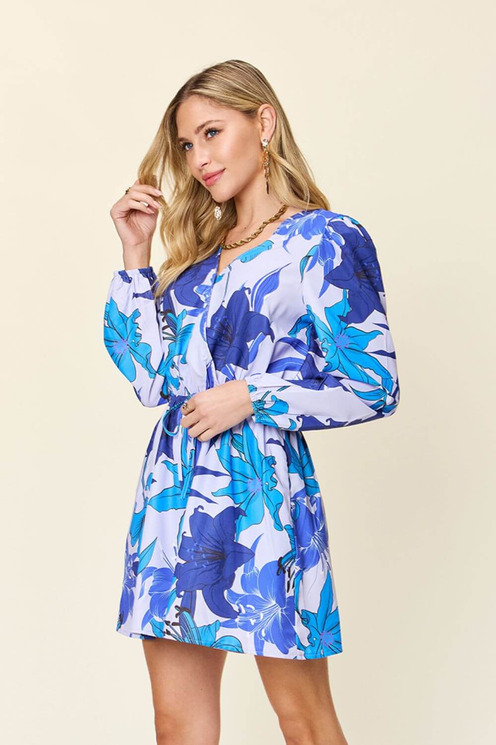 DOUBLE TAKE Full Size Floral Long Sleeve Romper with Pockets at Bella Road