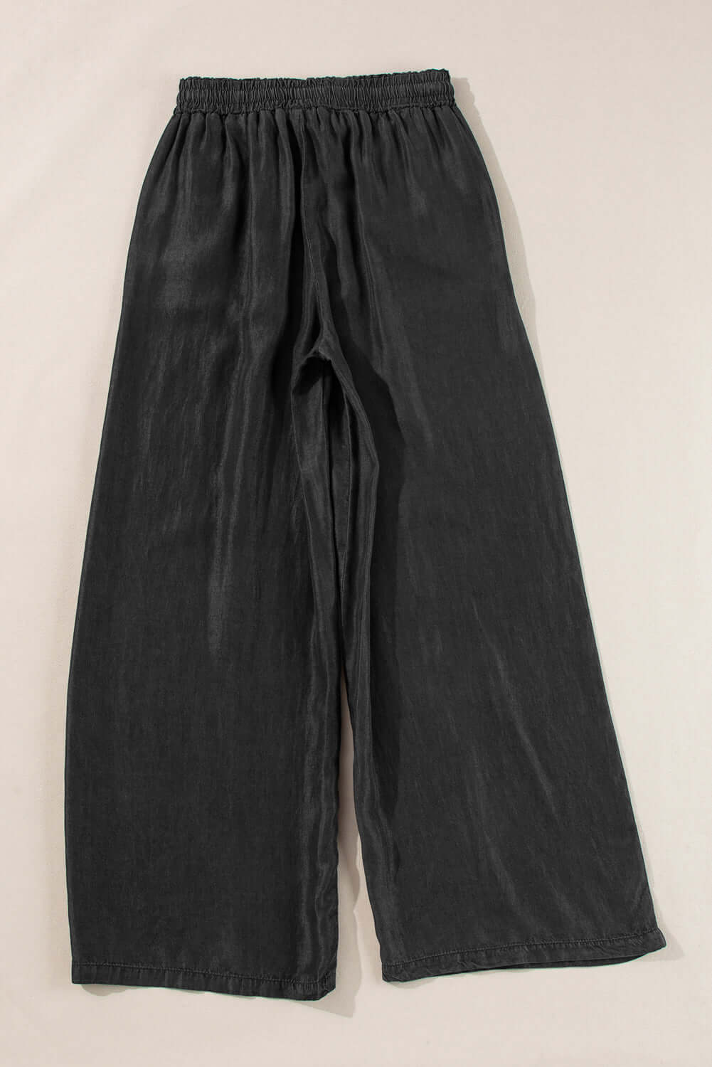 Bella Road Drawstring Wide Leg Jeans in black, featuring a comfortable elastic waist and trendy wide leg design.