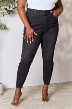 Curve model wearing Judy Blue Jeans, high waist denim jeans with tummy control for a slim silhouette, front pockets, slightly stretchy fabric