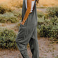 DOUBLE TAKE Full Size Sleeveless V-Neck Pocketed Jumpsuit at Bella Road