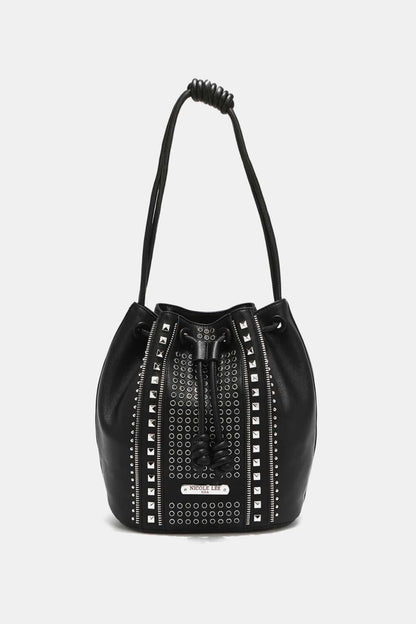 Nicole Lee USA Amy Studded Bucket Bag in black vegan leather with stud and zipper detailing, secure drawstring, and snap button closure.