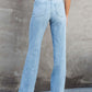 Back view of woman wearing Washed Straight Leg Jeans showing relaxed fit and washed denim style