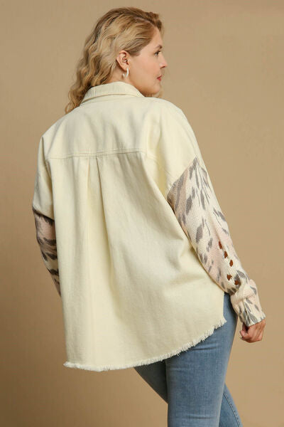 Back view of Umgee Plus Size Distressed Button Up Jacket with stylish raw hem and trendy patterned sleeves.