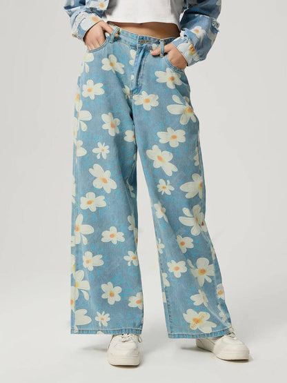 Bella Road floral wide leg jeans in light blue denim, featuring pockets and a playful flower pattern for a trendy look.